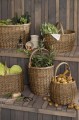 Owalny koszyk z pełnej wierzby z uchwytem w poprzek. Trwały, pojemny i ponadczasowy. Produkt dostępny w Ulica Ceramiczna & Home Design.