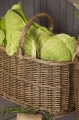 Owalny koszyk z pełnej wierzby z uchwytem w poprzek. Trwały, pojemny i ponadczasowy. Produkt dostępny w Ulica Ceramiczna & Home Design.