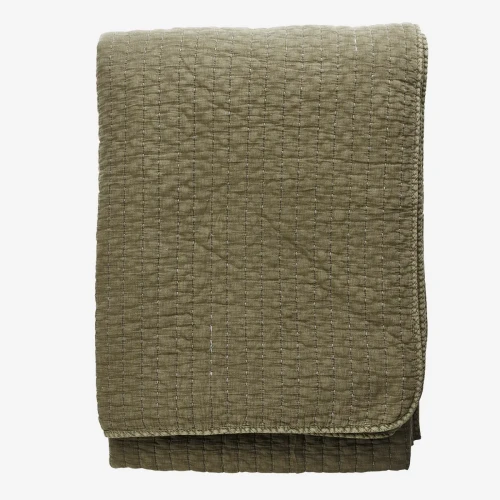 Narzuta bawełniana pikowana Madam Stoltz w kolorze khaki dostępna w sklepie Ulica Ceramiczna & Home Design