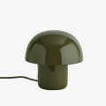Lampa stołowa Madam Stoltz w kolorze ciemnej zieleni to elegancki i stylowy element oświetlenia, dostępny w Ulica Ceramiczna & Home Design.