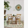 Lampa ścienna Madam Stoltz w kolorze ciemnej zieleni to elegancki i stylowy element oświetlenia, dostępny w Ulica Ceramiczna & Home Design.