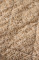 Bawełniana narzuta na łóżko Ib Laursen w drobne brązowe kwiatki dostępna w sklepie Ulica Ceramiczna & Home Design. Doskonale sprawdzi się jako dekoracyjne przykrycie łóżka lub przytulny koc na sofę.