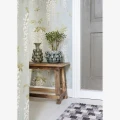 Niewielka ławka drewniana Madam Stoltz do przedpokoju, salonu lub sypialni w stylu skandynawskim i boho.